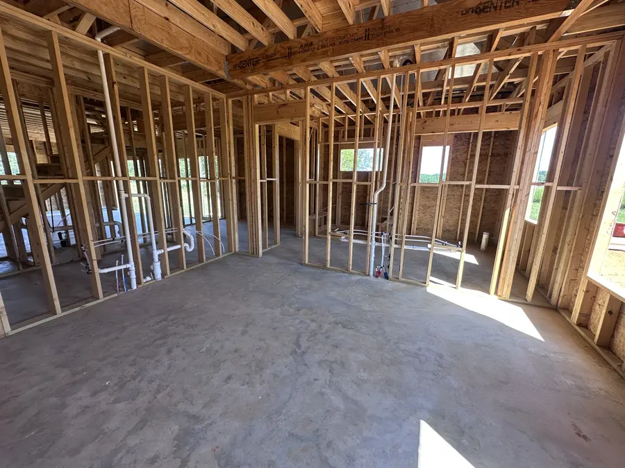 Interior framing of a custom home under construction by Still Oak Homes