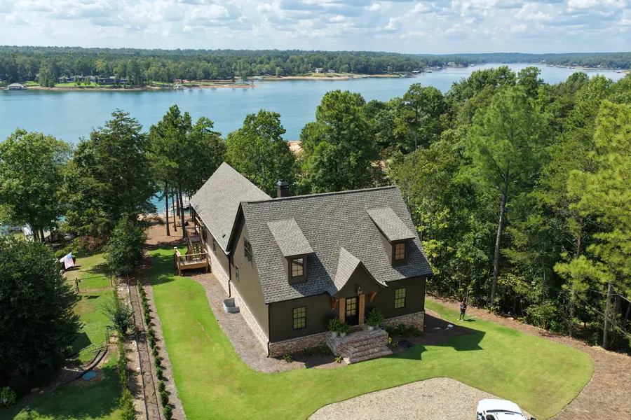 Aerial view of a custom lake house built by Still Oak Homes